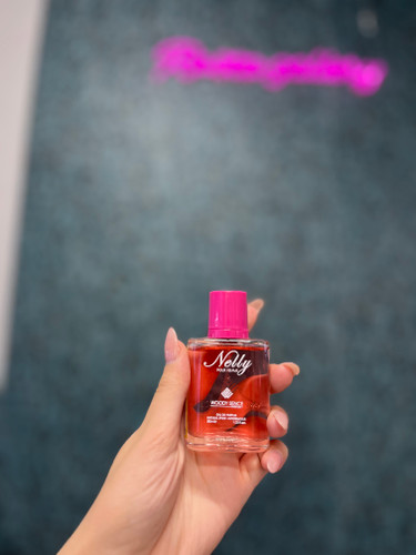عطر جیبی وودی سنس مدل NELLY